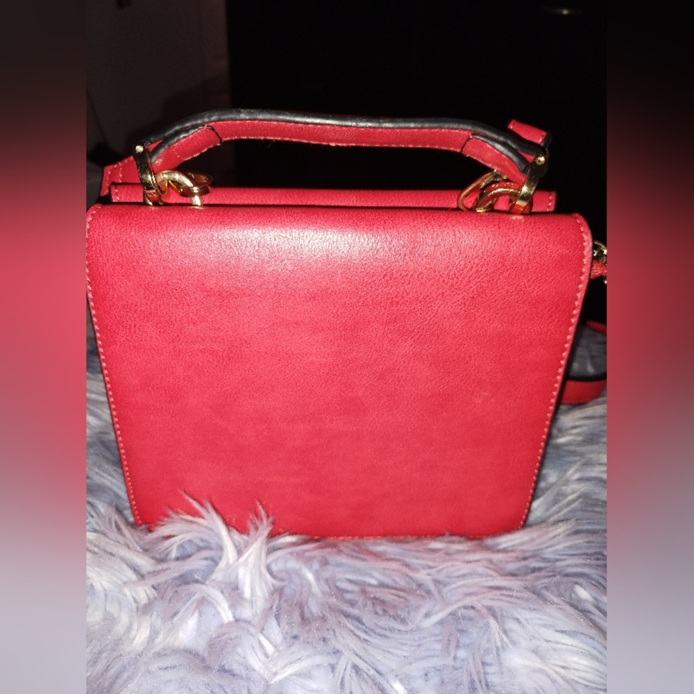 Red strap handbag